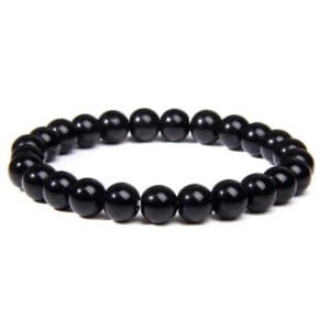 Pulsera ergonómica de ónix negro natural mostrada en imagen