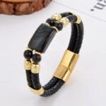 Pulsera de mujer de acero inoxidable con cierre dorado y cuero negro