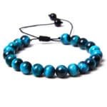 Pulsera Shamballa con cuentas azules y cordón negro Ojo de Halcón